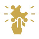 Gold puzzle piece in hand graphic